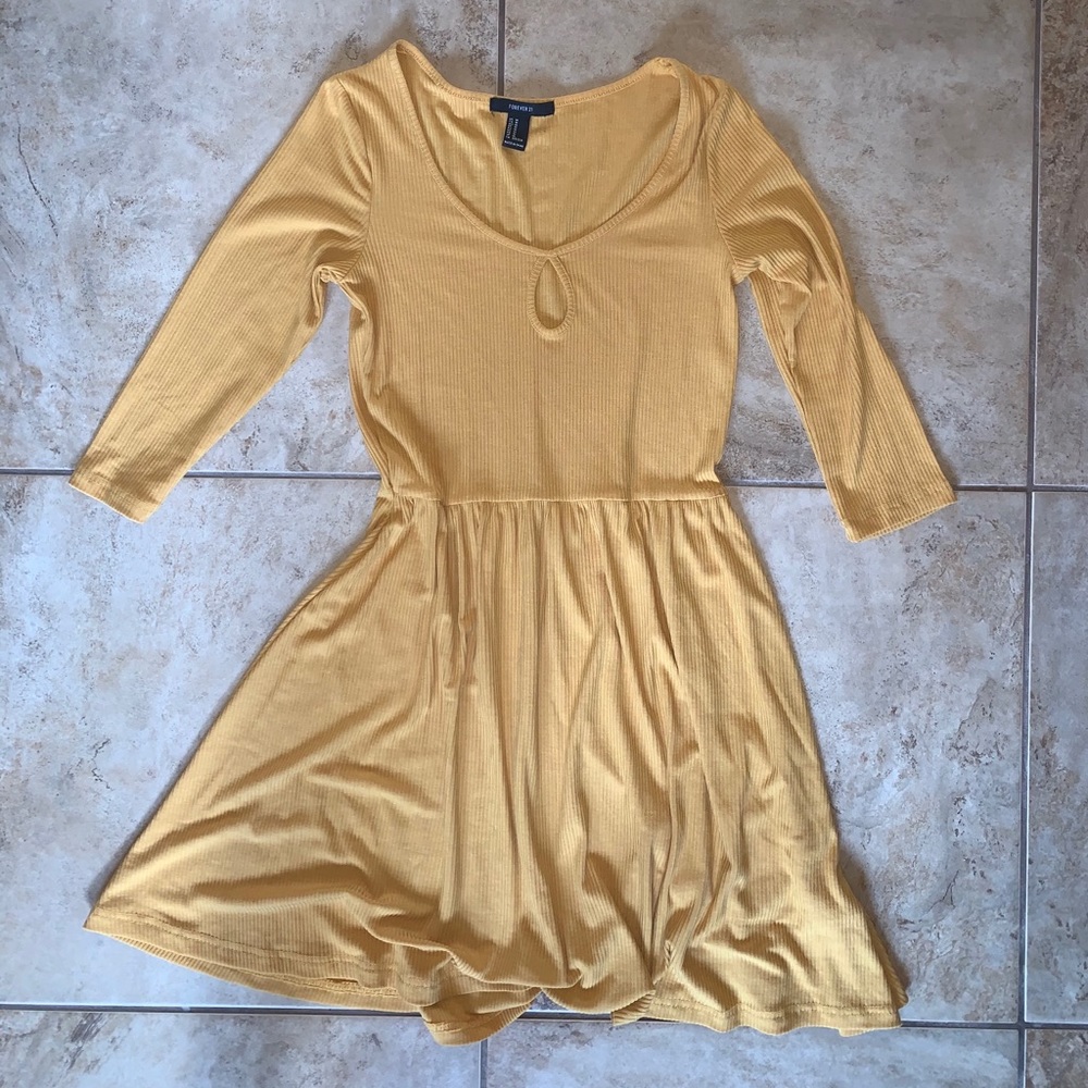 Gold dress with quarter length sleeves